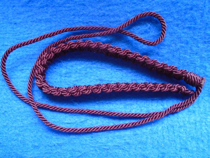 BRITISH ARMY QUEENS LANCASHIRE REGIMENT MAROON MACRAME LANYARD,  67CM LONG APPROX